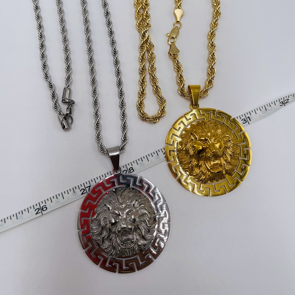 stainless steel, gold color lion pendant $55 each